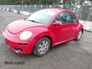 2009 Volkswagen New Beetle Coupe S with VIN 3VWPG31C99M512447, listed as a IAAI auction lot 41924303 with 136,898 mi miles. Bid and sale history available at carsss.com. Image 2.