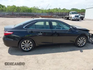 2015 Toyota Camry LE z VIN 4T1BD1FK5FU158648, wystawiony jako IAAI lot #42161671 z przebiegiem 118 109 mil mil oraz . Historia ofert i sprzedaży dostępna na DreamBid. Obrazek 13.