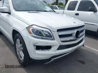2014 Mercedes-Benz GL 450 z VIN 4JGDF7CE0EA424081, wystawiony jako IAAI lot #42359465 z przebiegiem 145 363 mil mil oraz . Historia ofert i sprzedaży dostępna na DreamBid. Obrazek 19.