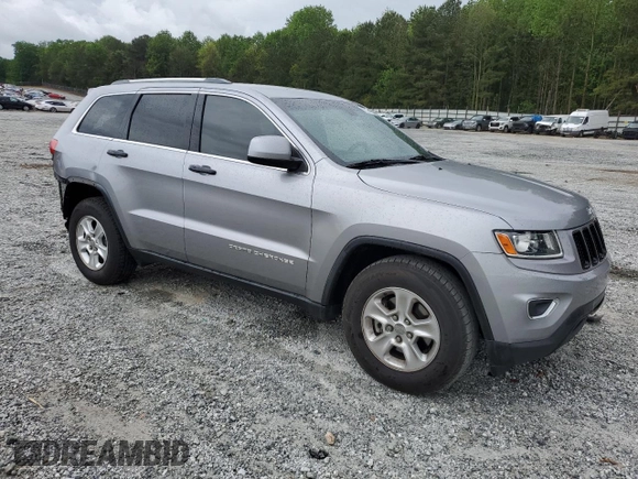 2014 Jeep Grand Cherokee Laredo with VIN 1C4RJEAG2EC179547, listed as a Copart auction lot 53328055 with 107,451 mi miles and Salvage Title. Bid and sale history available at DreamBid. Image 4.