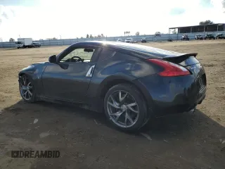 2013 Nissan 370Z with VIN JN1AZ4EH8DM382277, listed as a Copart auction lot 39709824 with 118,925 mi miles and Salvage Title. Bid and sale history available at carsss.com. Image 2.