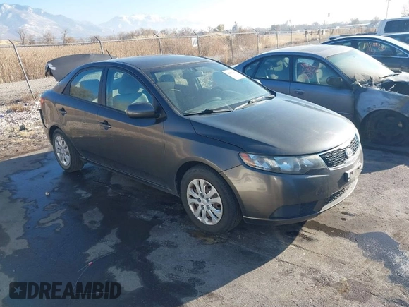 2011 Kia Forte EX with VIN KNAFU4A25B5358977, listed as a IAAI auction lot 40992404 with 137,478 mi miles. Bid and sale history available at carsss.com. Image 1.