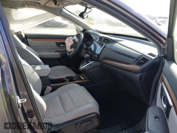 2020 Honda CR-V Touring with VIN 2HKRW2H91LH605995, listed as a IAAI auction lot 41672787 with 50,151 mi miles and . Bid and sale history available at DreamBid. Image 5.