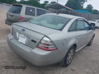 2008 Ford Taurus SEL with VIN 1FAHP24W48G125035, listed as a IAAI auction lot 42149505 with 201,502 mi miles. Bid and sale history available at carsss.com. Image 4.