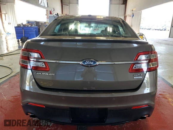 2015 Ford Taurus SEL with VIN 1FAHP2E94FG157022, listed as a Copart auction lot 74569614 with 133,223 mi miles and Salvage Title. Bid and sale history available at DreamBid. Image 6.