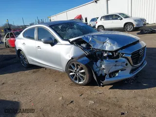 2018 Mazda Mazda3 4-Door Touring with VIN 3MZBN1V34JM179805, listed as a IAAI auction lot 41734757 with 59,468 mi miles. Bid and sale history available at carsss.com. Image 1.