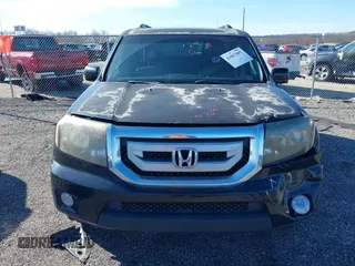 2011 Honda Pilot EX-L with VIN 5FNYF4H65BB004213, listed as a IAAI auction lot 41867681 with 157,644 mi miles and . Bid and sale history available at carsss.com. Image 12.