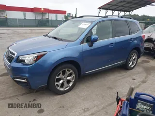 2018 Subaru Forester Touring with VIN JF2SJAWC6JH597365, listed as a IAAI auction lot 42606953 with 66,340 mi miles and . Bid and sale history available at DreamBid. Image 18.