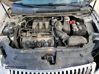 2008 Mercury Sable Premier z VIN 1MEHM42W38G600870, wystawiony jako Copart lot #50564345 z przebiegiem 211 414 mil mil oraz Nie do naprawy • Non repairable. Historia ofert i sprzedaży dostępna na DreamBid. Obrazek 11.