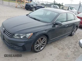 2016 Volkswagen Passat S with VIN 1VWAT7A37GC042880, listed as a IAAI auction lot 42092850 with 215,267 mi miles and . Bid and sale history available at DreamBid. Image 2.