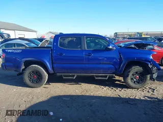 2023 Toyota Tacoma 4WD SR with VIN 3TMCZ5AN9PM559919, listed as a IAAI auction lot 41855044 with 46,153 mi miles. Bid and sale history available at carsss.com. Image 14.