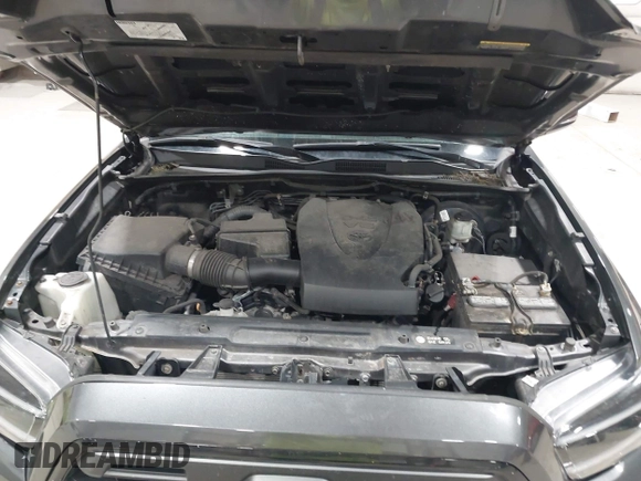 2017 Toyota Tacoma SR5 z VIN 5TFCZ5AN6HX111116, wystawiony jako IAAI lot #42054764 z przebiegiem 103 107 mil mil oraz . Historia ofert i sprzedaży dostępna na DreamBid. Obrazek 10.