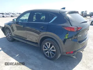 2018 Mazda CX-5 Grand Touring with VIN JM3KFADM8J0330035, listed as a IAAI auction lot 41878680 with 62,632 mi miles. Bid and sale history available at carsss.com. Image 3.
