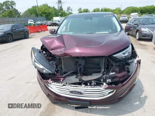 2019 Ford Edge Titanium with VIN 2FMPK4K96KBB20247, listed as a IAAI auction lot 42450212 with 121,756 mi miles and . Bid and sale history available at DreamBid. Image 12.