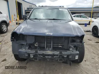 2009 Jeep Grand Cherokee Laredo with VIN 1J8HR48P49C545334, listed as a Copart auction lot 71562344 with 183,976 mi miles and Salvage Title. Bid and sale history available at carsss.com. Image 5.