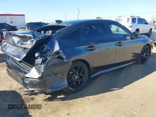 2024 Honda Civic Sport z VIN 2HGFE2F5XRH560239, wystawiony jako IAAI lot #41409263 z przebiegiem 10 030 mil mil oraz . Historia ofert i sprzedaży dostępna na DreamBid. Obrazek 4.