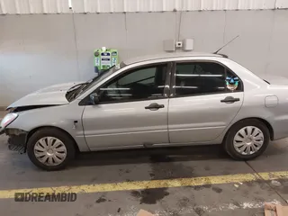2006 Mitsubishi Lancer ES with VIN JA3AJ26E96U070354, listed as a IAAI auction lot 41572102 with 235,943 mi miles. Bid and sale history available at carsss.com. Image 14.