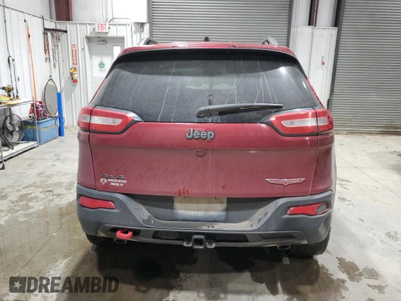 2017 Jeep Cherokee Trailhawk z VIN 1C4PJMBS4HW504142, wystawiony jako Copart lot #87918245 z przebiegiem 133 324 mil mil oraz Szkoda całkowita • Salvage title. Historia ofert i sprzedaży dostępna na DreamBid. Obrazek 6.