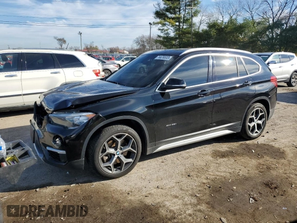 2016 BMW X1 xDrive28i z VIN WBXHT3C35G5E50005, wystawiony jako Copart lot #74476533 z przebiegiem 128 031 mil mil oraz Szkoda całkowita • Salvage title. Historia ofert i sprzedaży dostępna na DreamBid. Obrazek 1.