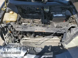 2005 Ford Focus S z VIN 3FAFP31N65R153304, wystawiony jako Copart lot #54253215 z przebiegiem 148 707 mil mil oraz Szkoda całkowita • Salvage title. Historia ofert i sprzedaży dostępna na DreamBid. Obrazek 11.