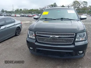 2010 Chevrolet Suburban LTZ with VIN 1GNUCKE02AR220449, listed as a IAAI auction lot 41665749 with 264,447 mi miles and . Bid and sale history available at DreamBid. Image 12.