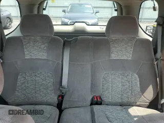 2003 GMC Envoy SLE z VIN 1GKDT13S732228585, wystawiony jako Copart lot #58764565 z przebiegiem 151 107 mil mil oraz Szkoda całkowita • Salvage title. Historia ofert i sprzedaży dostępna na DreamBid. Obrazek 10.
