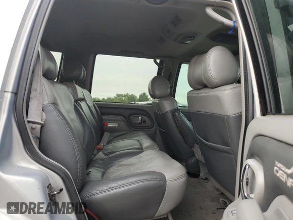 2000 GMC Denali z VIN 1GKEK13RXYR110436, wystawiony jako Copart lot #74311244 z przebiegiem 250 735 mil mil oraz Szkody całkowita. Historia ofert i sprzedaży dostępna na DreamBid. Obrazek 11.