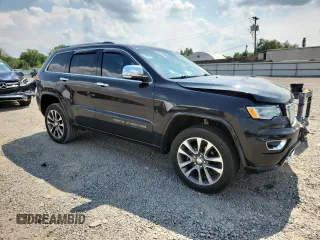 2017 Jeep Grand Cherokee Overland z VIN 1C4RJFCG4HC818132, wystawiony jako Copart lot #62642775 z przebiegiem 116 815 mil mil oraz Szkoda całkowita • Salvage title. Historia ofert i sprzedaży dostępna na DreamBid. Obrazek 4.