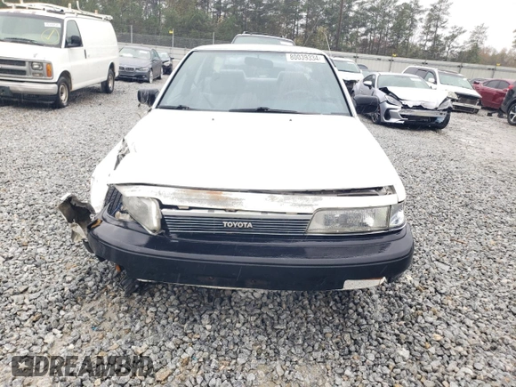 1988 Toyota Camry z VIN JT2SV21E7J3277138, wystawiony jako Copart lot #80039334 z przebiegiem 152 555 mil mil oraz Szkoda całkowita • Salvage title. Historia ofert i sprzedaży dostępna na DreamBid. Obrazek 5.