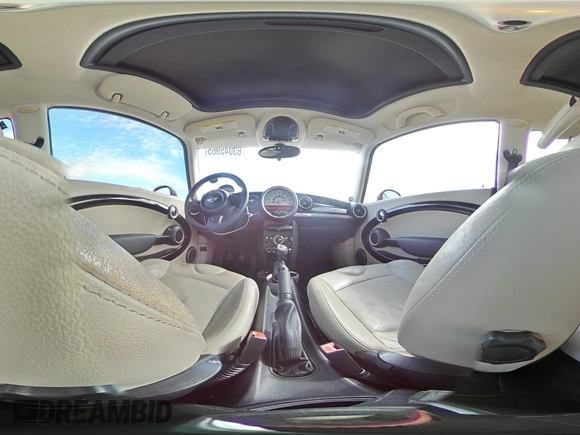 2012 MINI Hardtop with VIN WMWSU3C52CT367682, listed as a Copart auction lot 63045965 with 124,683 mi miles and Salvage title. Bid and sale history available at DreamBid. Image 14.