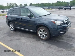 2018 Subaru Forester Touring with VIN JF2SJAWC2JH492788, listed as a IAAI auction lot 42358591 with 83,354 mi miles and . Bid and sale history available at DreamBid. Image 1.