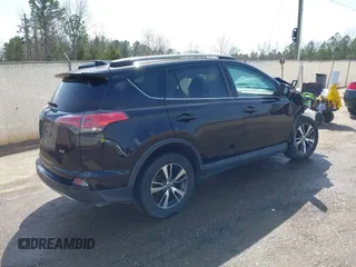 2018 Toyota RAV4 XLE with VIN 2T3WFREVXJW444002, listed as a IAAI auction lot 41795600 with 115,120 mi miles. Bid and sale history available at carsss.com. Image 4.