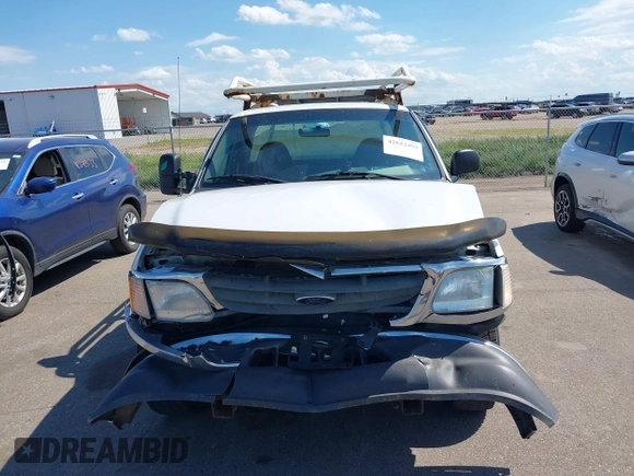 2003 Ford F-150 XL z VIN 2FTRF17WX3CA79406, wystawiony jako IAAI lot #42622453 z przebiegiem Nie podano mil oraz . Historia ofert i sprzedaży dostępna na DreamBid. Obrazek 11.