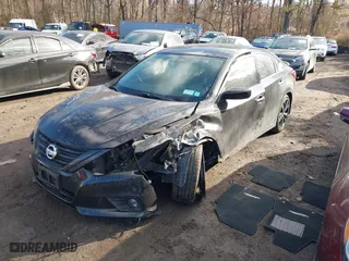 2018 Nissan Altima 2.5 SV with VIN 1N4AL3AP6JC244153, listed as a IAAI auction lot 41658699 with 54,486 mi miles. Bid and sale history available at carsss.com. Image 17.