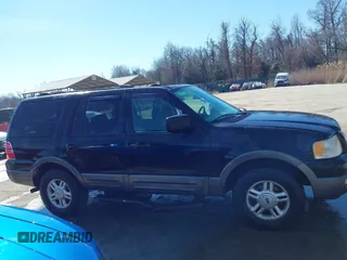 2004 Ford Expedition Special Service with VIN 1FMPU16L44LA17586, listed as a IAAI auction lot 41619534 with 140,299 mi miles. Bid and sale history available at carsss.com. Image 14.