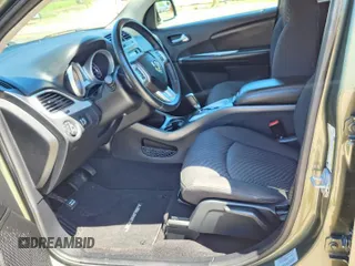 2017 Dodge Journey SXT with VIN 3C4PDCBG4HT598882, listed as a Copart auction lot 56783495 with 89,771 mi miles and Salvage Title. Bid and sale history available at DreamBid. Image 14.