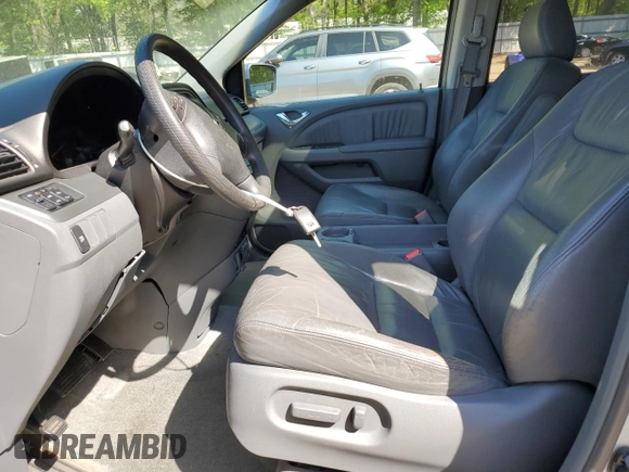 2005 Honda Odyssey EX-L z VIN 5FNRL386X5B034514, wystawiony jako Copart lot #52702435 z przebiegiem 65 988 mil mil oraz Szkoda całkowita • Salvage title. Historia ofert i sprzedaży dostępna na DreamBid. Obrazek 7.