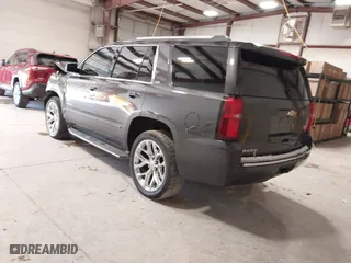 2015 Chevrolet Tahoe LTZ with VIN 1GNSCCKC2FR114442, listed as a IAAI auction lot 41629816 with 152,768 mi miles. Bid and sale history available at carsss.com. Image 3.