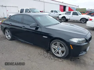 2014 BMW 5 Series 550i z VIN WBAKN9C55ED000854, wystawiony jako IAAI lot #41759133 z przebiegiem 86 348 mil mil oraz . Historia ofert i sprzedaży dostępna na DreamBid. Obrazek 1.