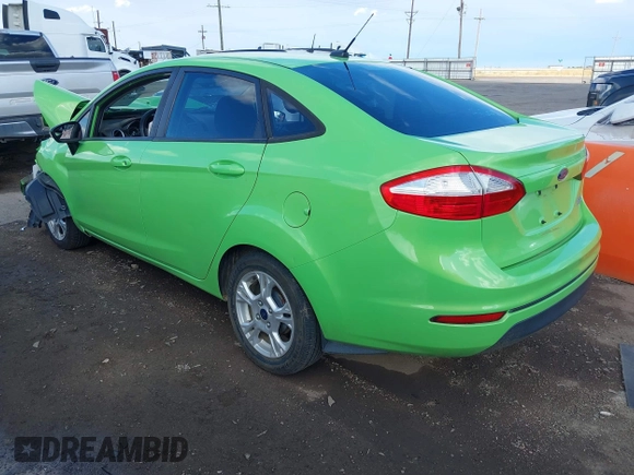 2014 Ford Fiesta SE with VIN 3FADP4BJ2EM203010, listed as a IAAI auction lot 40763881 with 60,803 mi miles. Bid and sale history available at carsss.com. Image 3.