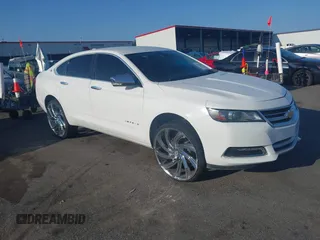 2015 Chevrolet Impala LT z VIN 2G1115SL9F9211016, wystawiony jako IAAI lot #42109483 z przebiegiem 215 989 mil mil oraz . Historia ofert i sprzedaży dostępna na DreamBid. Obrazek 1.