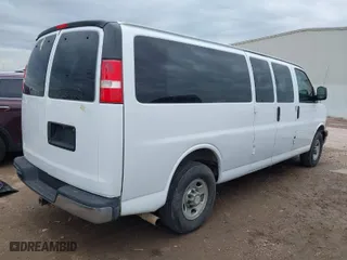 2014 Chevrolet Express Passenger LT with VIN 1GAZG1FG6E1119310, listed as a IAAI auction lot 41913430 with 130,442 mi miles. Bid and sale history available at carsss.com. Image 4.