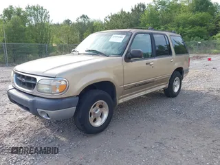 1999 Ford Explorer XLT with VIN 1FMZU34E3XUA80301, listed as a IAAI auction lot 42094304 with 145,373 mi miles and . Bid and sale history available at DreamBid. Image 2.