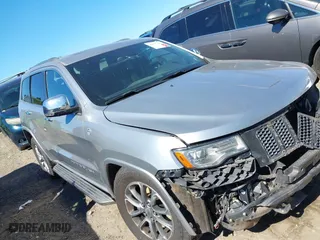 2014 Jeep Grand Cherokee Overland with VIN 1C4RJFCM4EC316142, listed as a IAAI auction lot 40607061 with 195,008 mi miles. Bid and sale history available at carsss.com. Image 1.