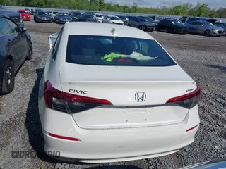 2023 Honda Civic Sport with VIN 2HGFE2F54PH512362, listed as a IAAI auction lot 41401479 with 12,672 mi miles and . Bid and sale history available at DreamBid. Image 16.