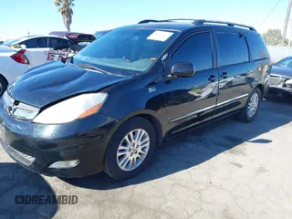 2009 Toyota Sienna XLE with VIN 5TDZK22C69S273555, listed as a IAAI auction lot 41276221 with 129,160 mi miles and . Bid and sale history available at DreamBid. Image 17.