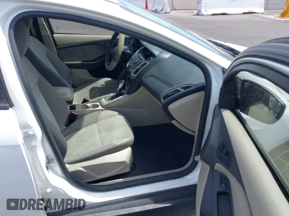 2012 Ford Focus SE with VIN 1FAHP3F24CL462319, listed as a IAAI auction lot 41981509 with 124,831 mi miles. Bid and sale history available at carsss.com. Image 5.