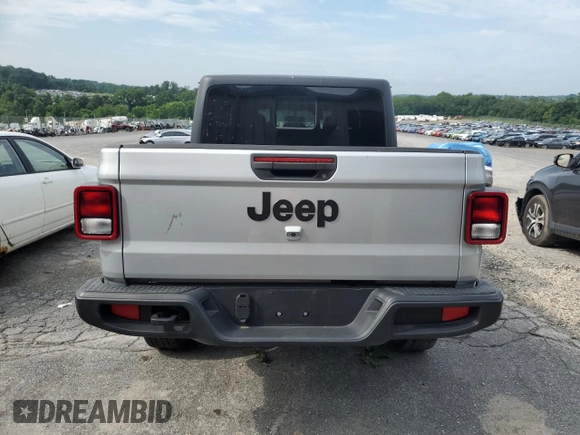2023 Jeep Gladiator Sport S с VIN 1C6HJTAG8PL534103, выставлен на аукционе Copart как лот 63114795 с пробегом 42 054 миль миль и Списание • Salvage title. История ставок и продаж доступна на DreamBid. Изображение 6.