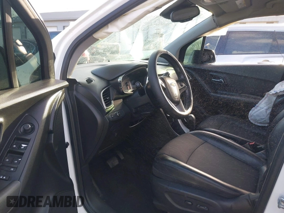 2020 Chevrolet Trax LT with VIN KL7CJLSB0LB083963, listed as a IAAI auction lot 42073793 with 62,925 mi miles and . Bid and sale history available at DreamBid. Image 5.