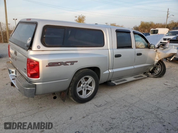 2007 Dodge Dakota ST z VIN 1D7HW28PX7S265270, wystawiony jako Copart lot #78265494 z przebiegiem 154 418 mil mil oraz Szkoda całkowita • Salvage title. Historia ofert i sprzedaży dostępna na DreamBid. Obrazek 3.